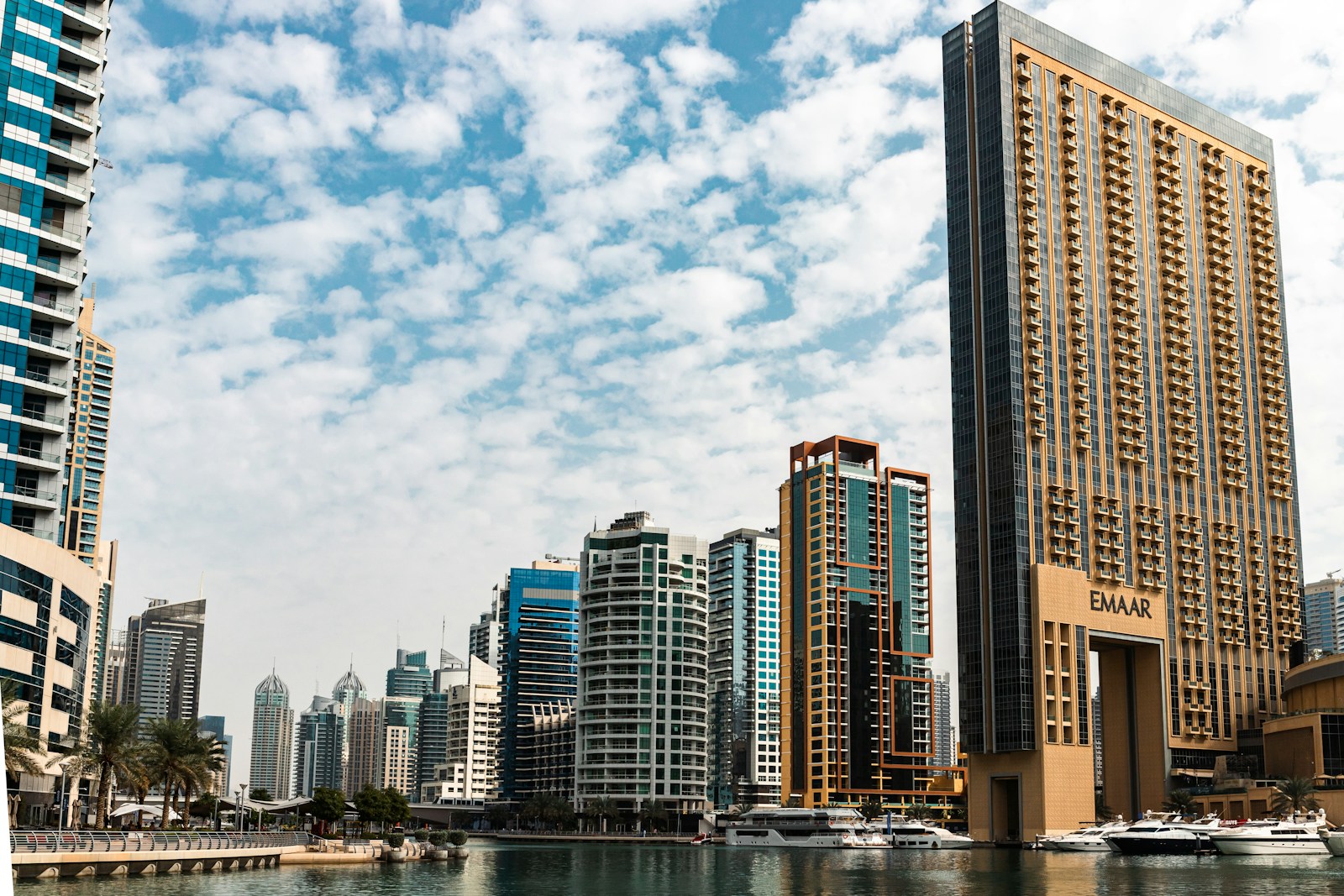 a large body of water in front of tall buildings